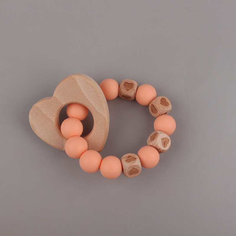 La pulsera de mordedor para bebé de juguete de haya 2025 puede morder el mordisco del bebé