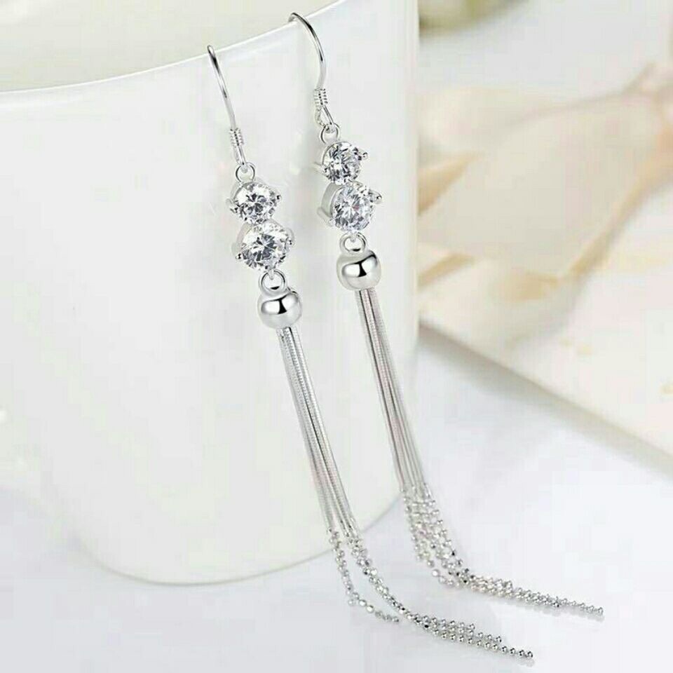 Small design earrings with tassels