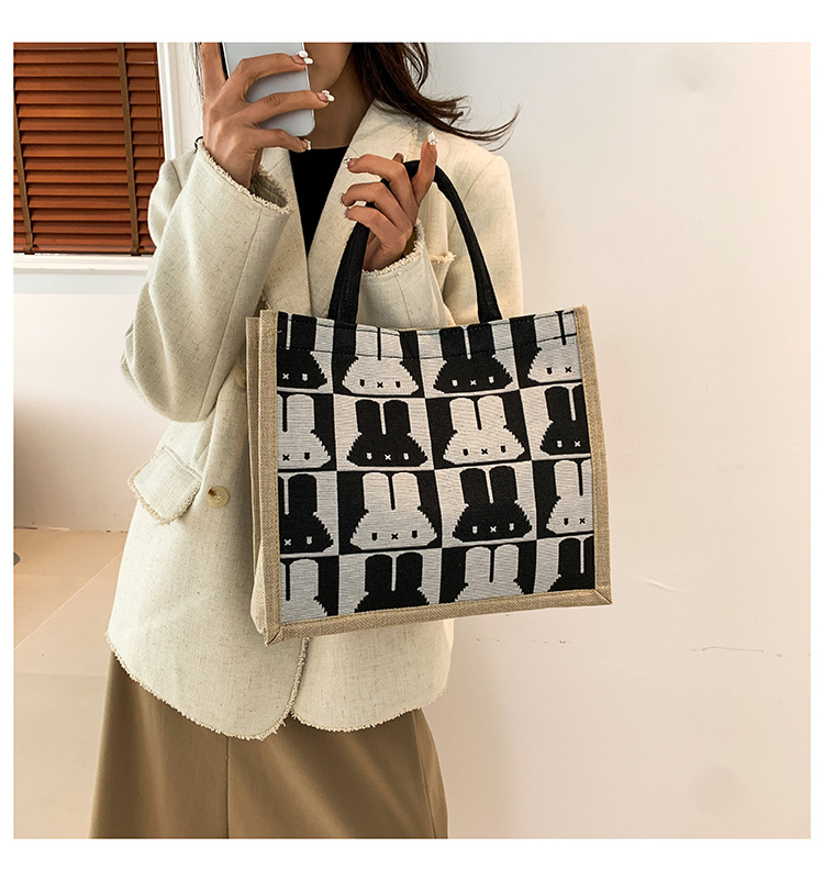 High-end mid-capacity canvas school commuting handbag 2024 new style fashionable and versatile linen single-shoulder tote bag full figure