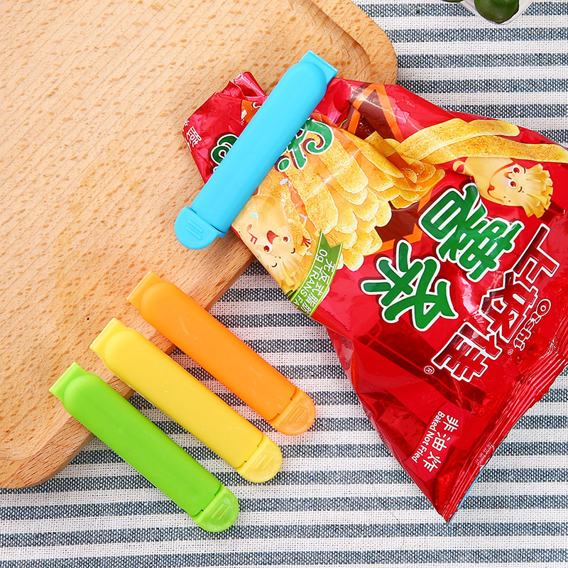 Fábrica al por mayor pequeño 7cm clip de sellado de alimentos bocadillos a prueba de humedad clip de sellado multicolor opcional LOGO imprimible