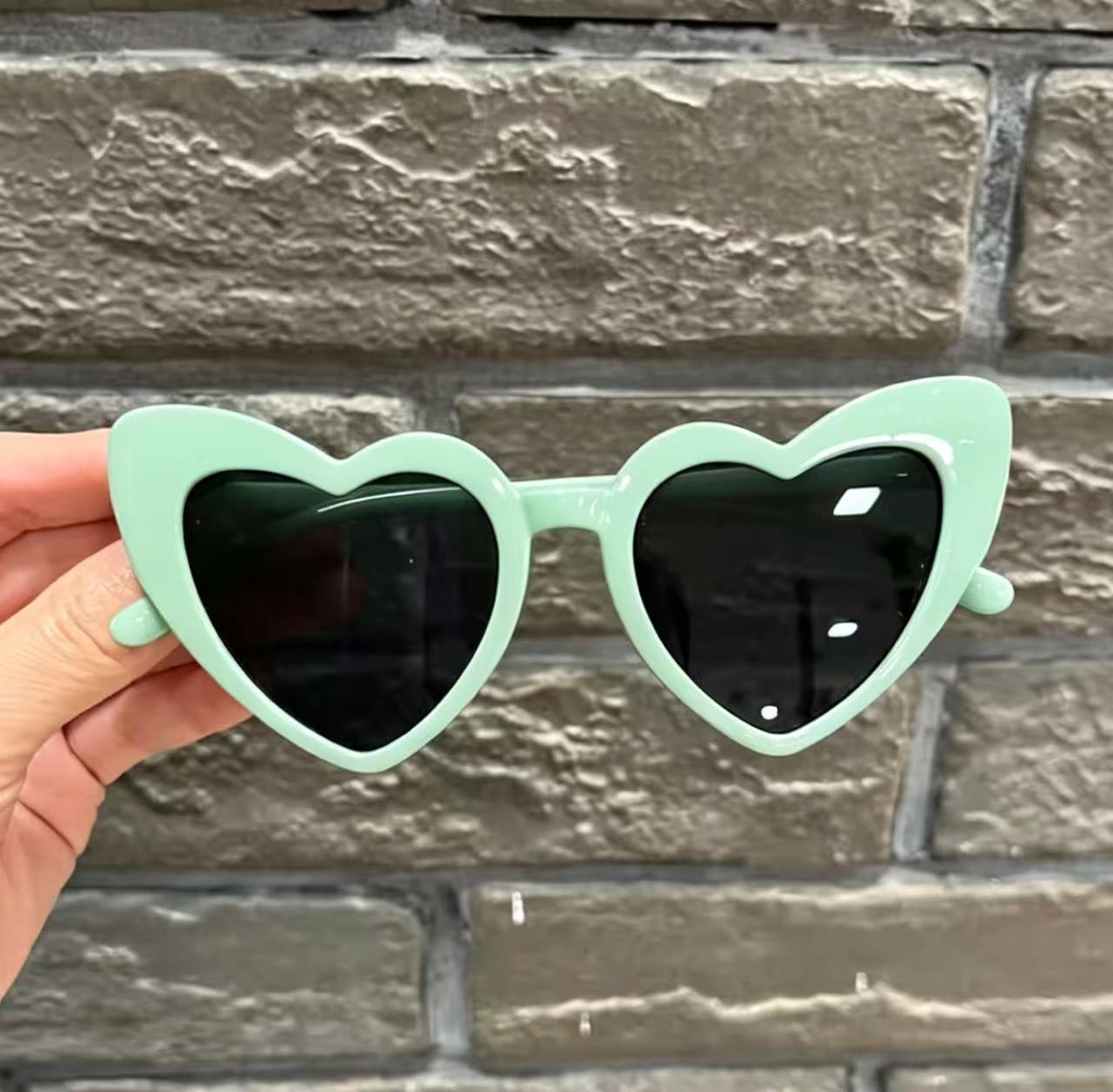 Mint green frame, gray lens