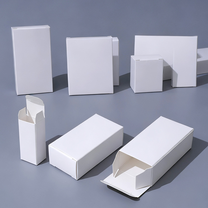 En stock pequeña caja blanca caja de enchufe rectangular caja de embalaje neutral 300g cartón blanco caja pequeña caja de cartón blanco al por mayor