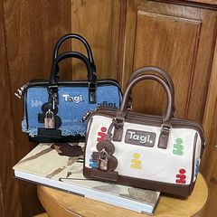 Tagi.《百宝箱》砰砰尼龙拼皮手提斜跨旅行包袋大容量斜跨包