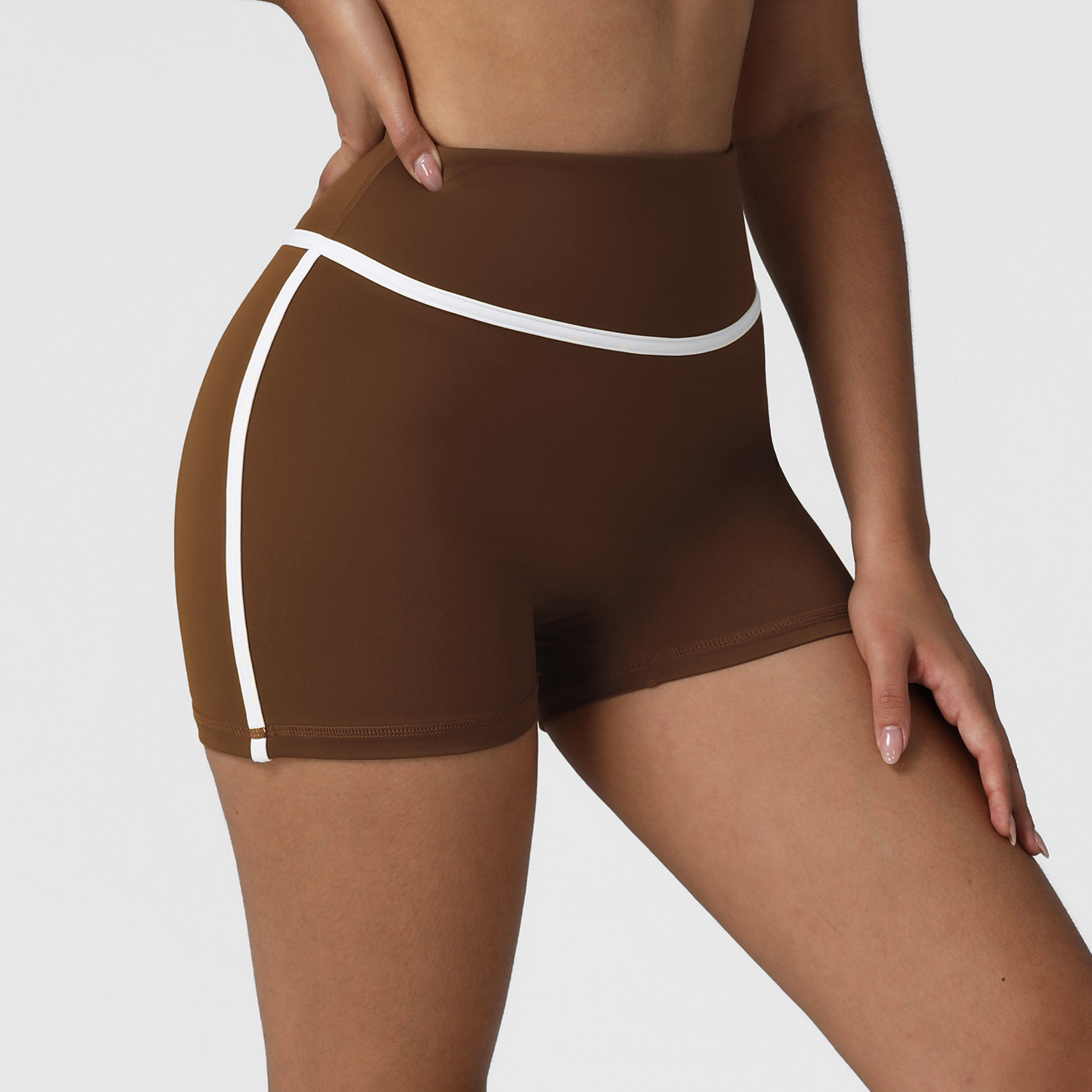 Pantalones cortos de yoga de cintura alta y abdomen de color de contraste europeo y americano