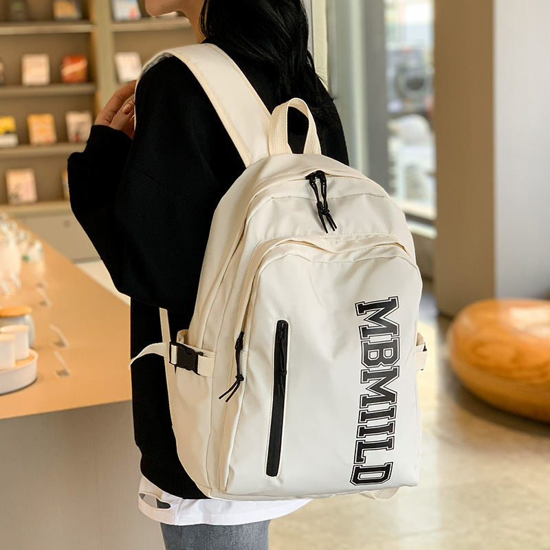 2024 nueva mochila japonesa simple de moda mochila de estudiantes de escuela secundaria gran capacidad mochila de viaje a prueba de rociadores