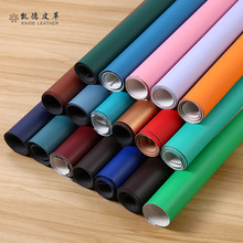 厂家批发PU水刺100纹皮革 笔记本册封面陶瓷盒包装皮盒人造革