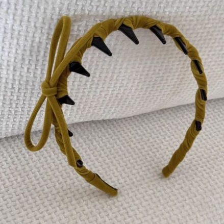 # 68 ginger bow wavy hairband