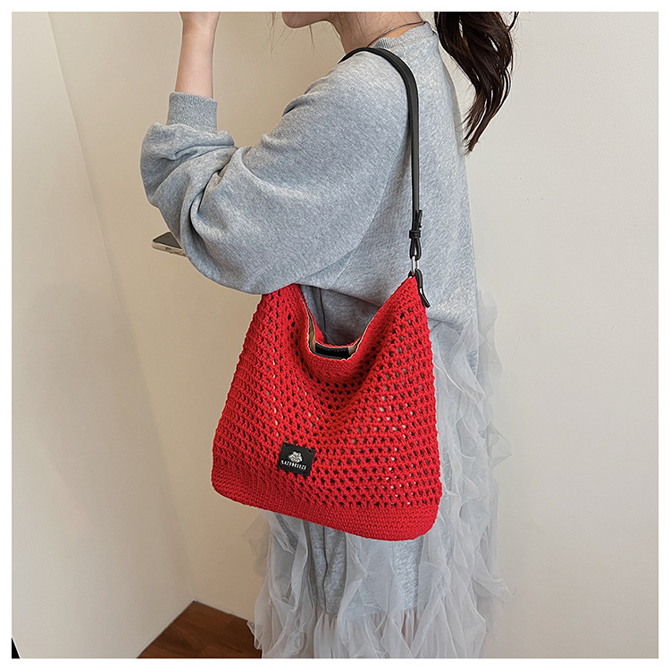 Summer hollowed-out knitted underarm bag for women, 2025 new style, laid-back and relaxed, seaside vacation style single-shoulder crossbody bag undefined