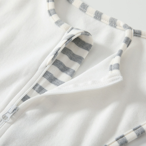 Cross-border baby swaddle sleeping bag, raising hands to prevent kicking, newborn baby solid color cotton sleeping bag, anti-jumping quilt, spring and autumn