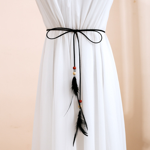 Ladies' fine Korean-style sash with a delicate fit, perfect for dresses and blouses. Features feather-tied waistband with tassels, Korean-inspired design.