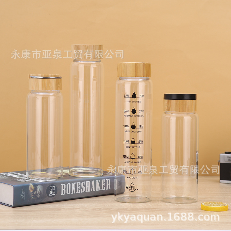 Fabricantes de suministro de copas de bambú portátiles de vidrio transparente aislamiento térmico taza de agua de oficina acompañante taza de regalo se puede imprimir logotipo