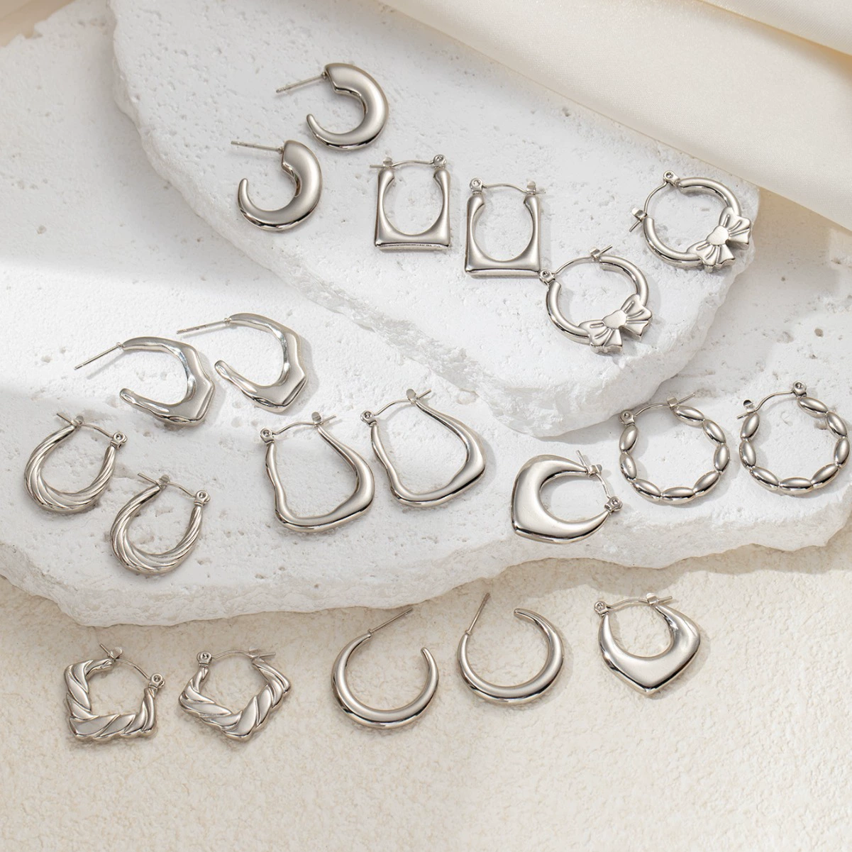 Корейская версия титановой стали нерегулярной серебряной иглы дикие нишевые серьги женская атмосфера дизайн не выцветает