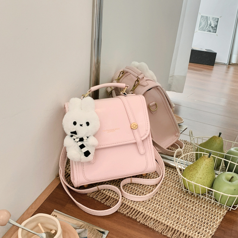 Cantos colgantes de dibujos animados de hombro pequeño bolso de mujer de verano estilo coreano nicho color sólido mochila mujer