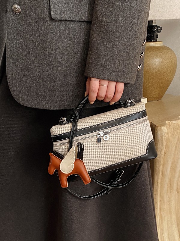 Bolso de mano de alta sensación 2026 nuevo lienzo de moda bolso de color pequeño bolso cuadrado de viaje bolsa de mochila ocio