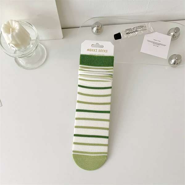 Stripes all over - thin green and white stripes