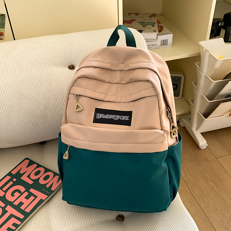 Nuevo paquete de dolor lindo de gran capacidad 2025 empalme de color de moda y viaje de ocio con 100 pares de hombros de alto valor facial inicial