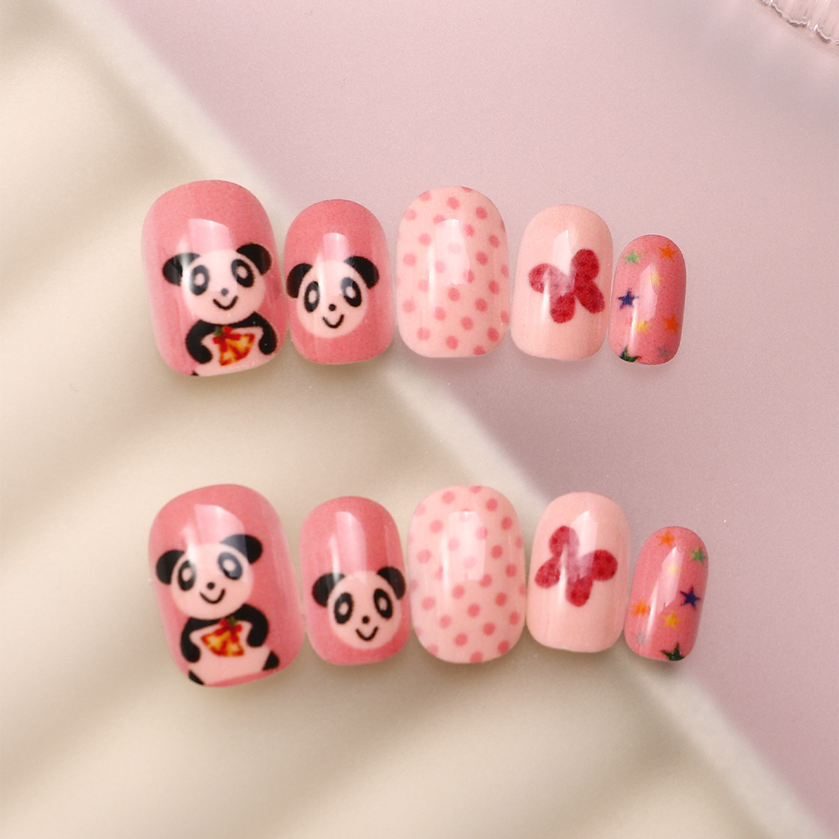 Juego de 24 piezas de uñas postizas para niños con diseño de dibujos animados, desmontables con adhesivo y exquisito diseño.