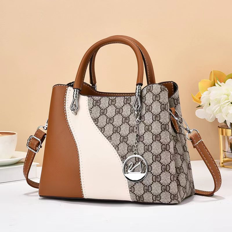 Fabricantes de bolsas de mano de textura nuevas bolsas de mujer de comercio exterior Taizhou bolsas de mujer una bolsa clásica