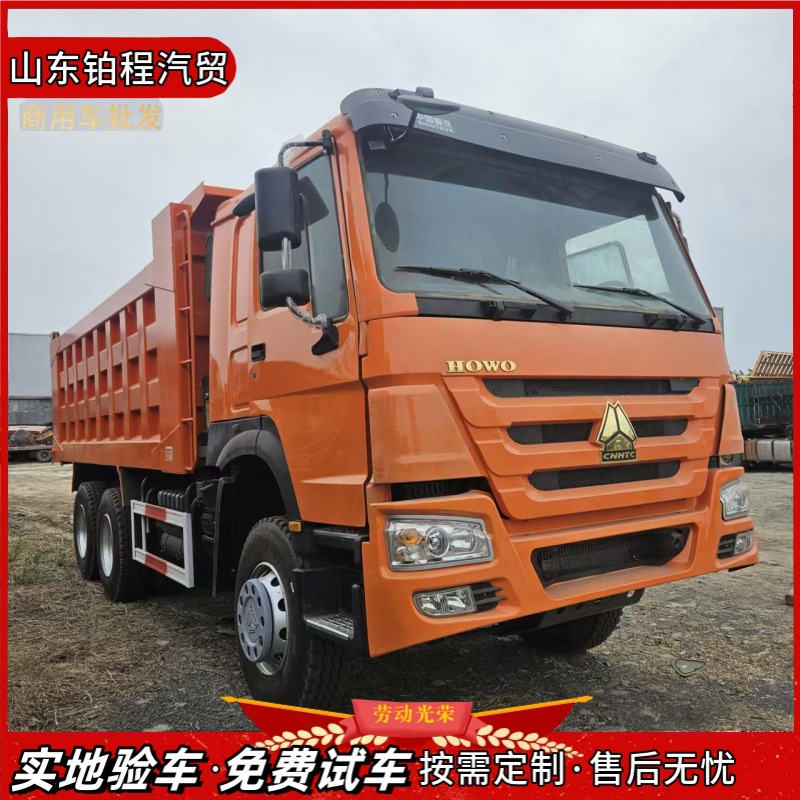 Manufacturer exports cross-border engineering dump trucks, HOWO 371 eight-wheel diesel trucks for infrastructure engineering and soil transport