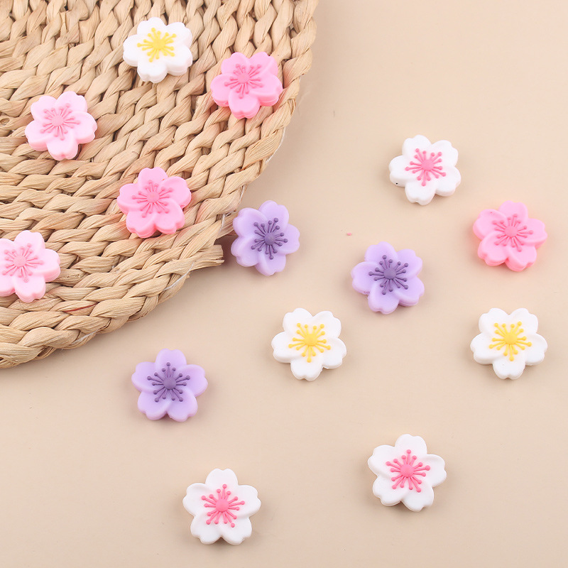 Productos creativos para bebés de bricolaje, flores de begonia, joyas de silicona, chupetes, accesorios de pulsera de mordedor de cadena anti-caída