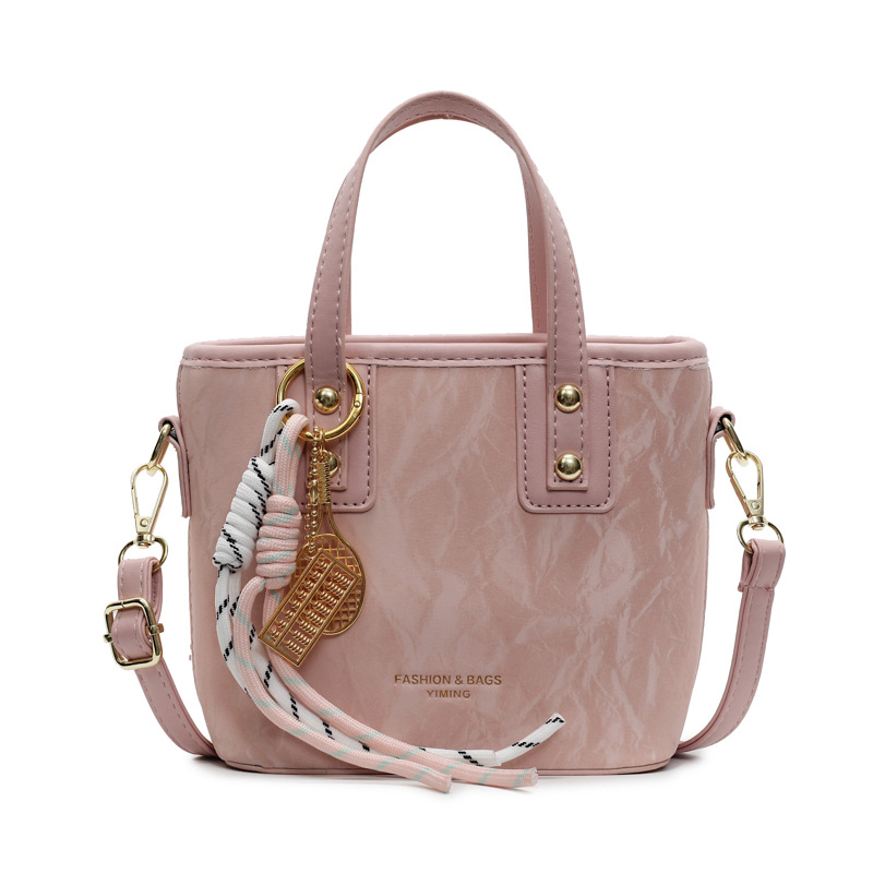 Comercio exterior explosión bolso de cubo de mano mujer 2025 nuevo simple bolso de hombro casual red explosión bolso de mochila coreano