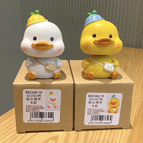 Creative MOMO yellow duck head-bobbing ornament car decoration for women cute yellow duck office decoration internet celebrity car interior