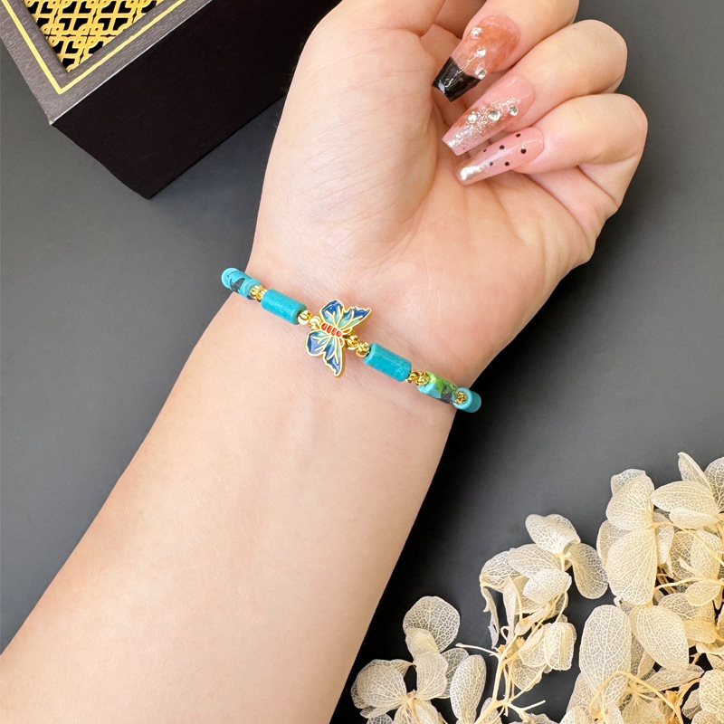 Vietnam oro tubo de perlas de pulsera ajustable empujando y tirando goteo de aceite ardiente mariposa azul durante mucho tiempo no se desvanece el estilo nacional femenino de alta calidad