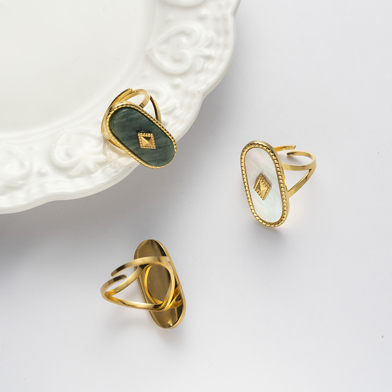 TENA tendencia europea y americana en el anillo abierto de 18 quilates conchas de oro lapis lazuli verde dongling moda joyería de acero de titanio