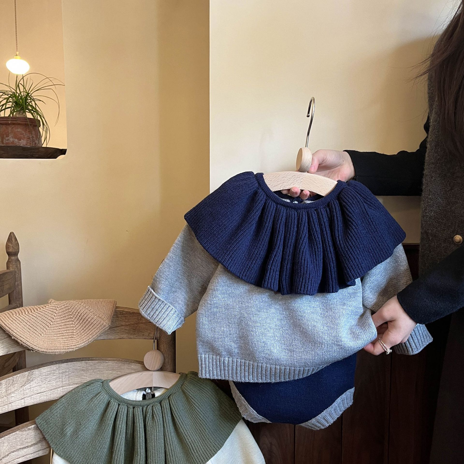 Estilo coreano primavera nuevo collar de loto Super lindo punto superior conejo cola pantalones cortos estilo occidental traje de niña