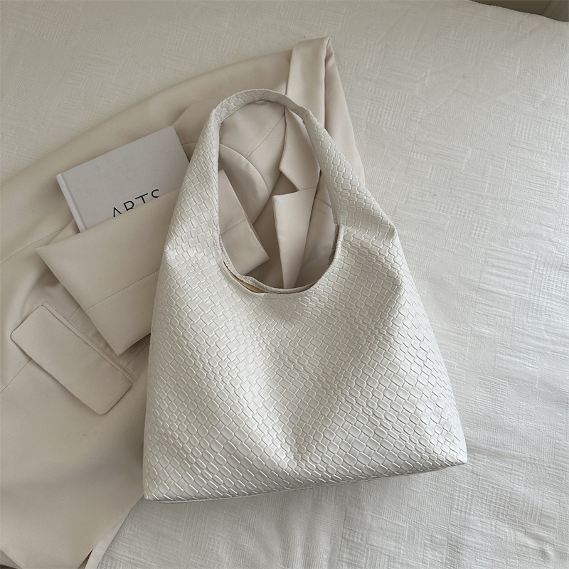 Otoño y invierno retro bolsos de dos piezas 2024, bolsos de moda de mujer, bolsos de hombro portátiles extranjeros, bolsos simples.