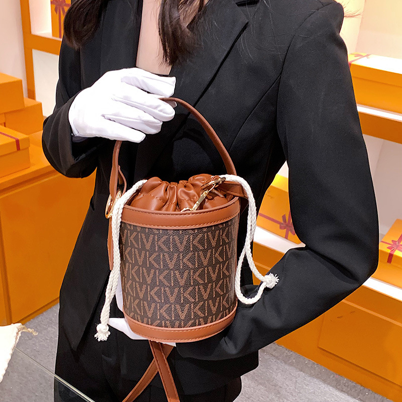 New high-end texture women's bag bucket bag women's mini shoulder crossbody bag summer soft leather popular small bag_voghion.com