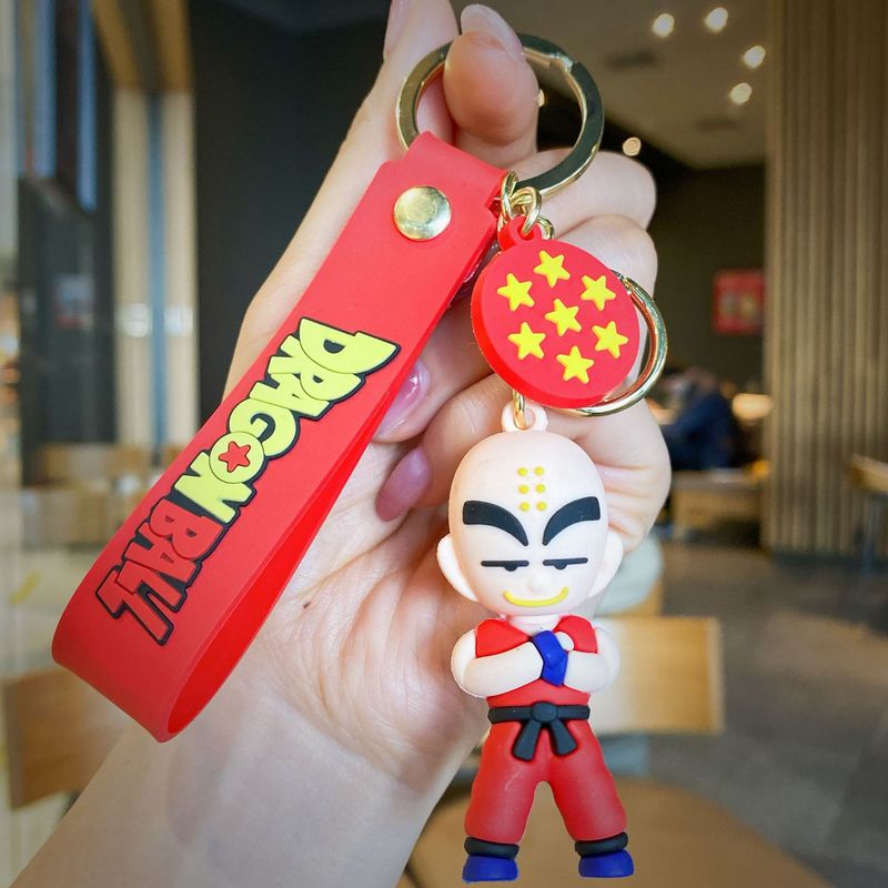 アニメの七龍珠のキーは立体の孫悟空の公仔のかばんの自動車のキーチェーンを掛けて贈り物の卸売りを飾ります。|undefined
