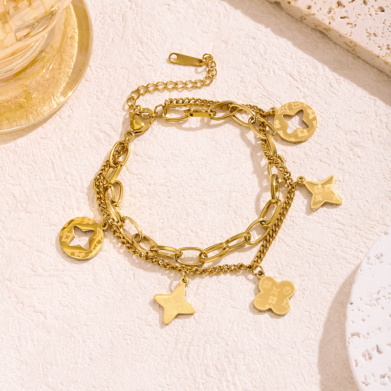 Cross-border Explosions Golden Hollow Four-leaf Clover Tassel Bracelet Women's Color-free Japanese and Korean Fashion Prismatic Floret Bracelet