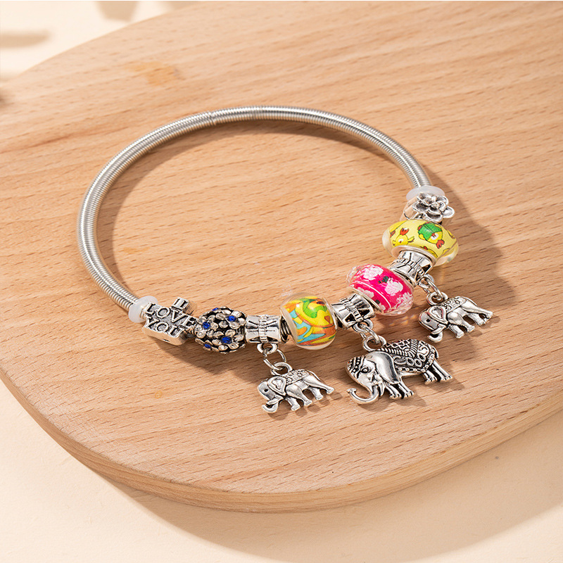 Panjia pulsera Dora DIY cuentas explosivas transfronterizas colgante de elefante letras de cristal cuentas pétalos pulsera ajustable