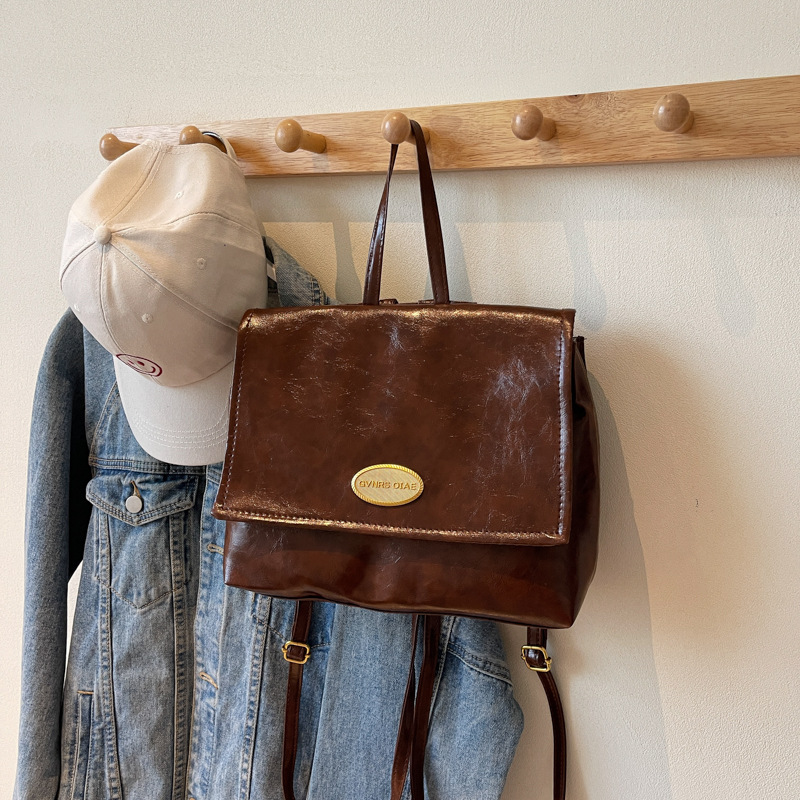 Mochila coreana retro de estilo universitario 2024 invierno nuevo simple de gran capacidad de mano mochila de hombro para viajar