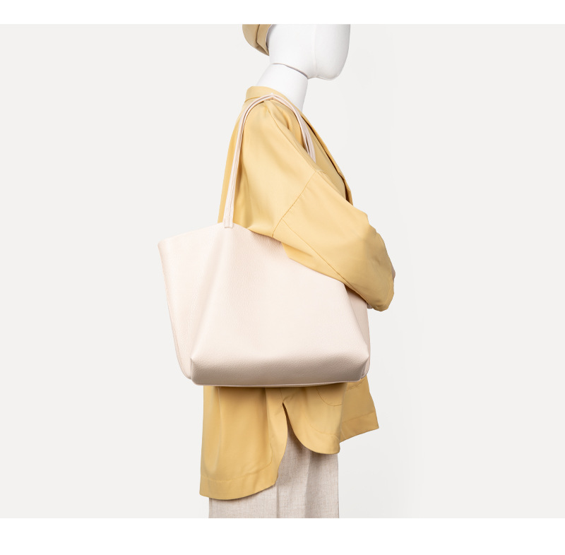 Nuevo diseño de nicho coreano, bolso de hombro de cuero suave con estampado de lichi para mujer, bolso de mano sencillo de gran capacidad para desplazamientos diarios_voghion.com