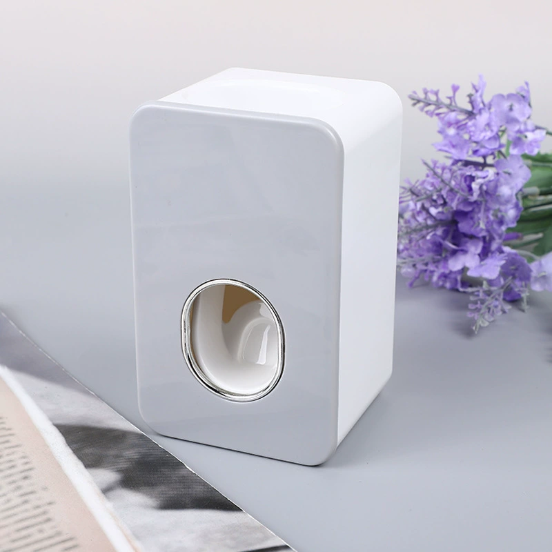 Foreign trade thermal selling free punching automatic squeeze toothpaste sanitary wares collection toothpaste artifact factory direct selling can be fixed