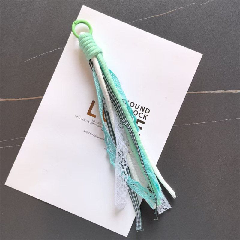 Accesorios de éxito en línea de teléfono móvil cordón de encaje de viento de dopamina accesorios bolsos llaveros colgantes al por mayor image 13