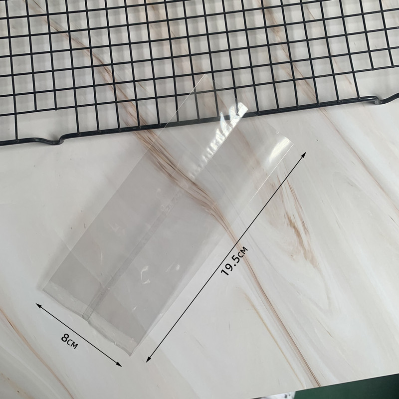 Venta al por mayor bolsa de pastel de Luna transparente sin color impresión embalaje bolsa yema de huevo plástico crujiente nieve bolsa de embalaje 100