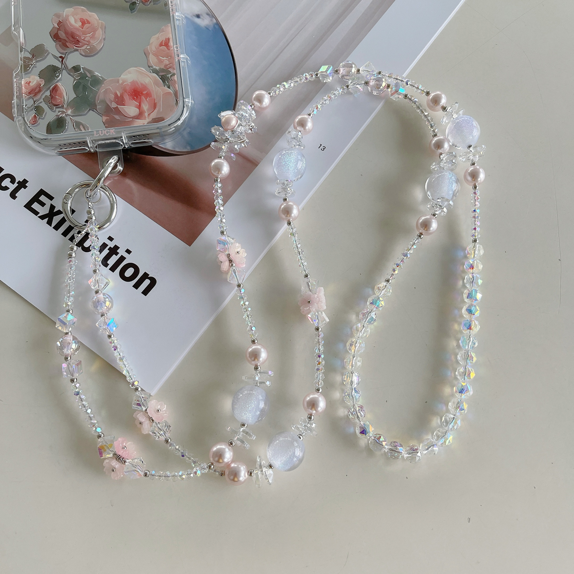 Boutique hecho a mano de alta gama para teléfono móvil cadena larga de cristal ins fresco cordón de teléfono móvil de moda colgante de mensajero largo