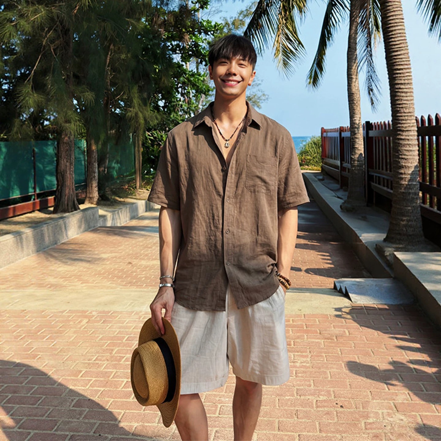 Old-fashion style brown linen shirt for men, summer vacation wear, ice silk sun protection shirt, casual short-sleeved shirt with a married man feel.