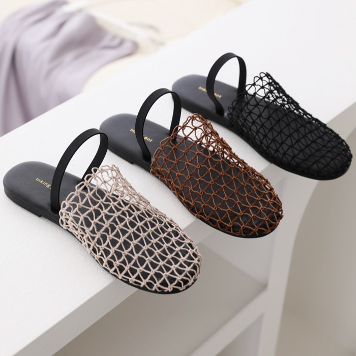 European and American Niche Fishnet Woven Cut Out Roman Sandals for Women Summer New Fisherman Flats Round Toe Half Slippers
