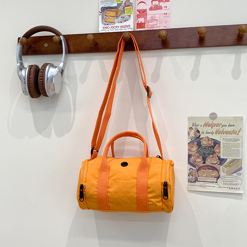 Bolso de hombro para niños y niñas de estilo coreano, color de contraste de moda, bolso de tubo portátil para bebé simple casual, nuevo bolso de almohada para niños