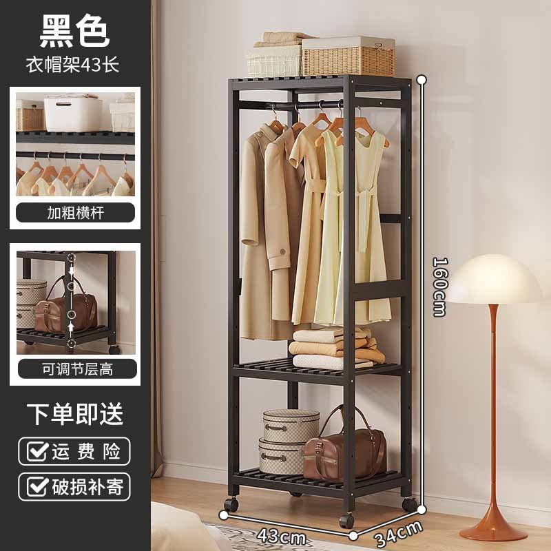 ハンガーを掛けて着地した寝室の家庭用ロッカー付き収納ベッドの上の夜に服を置く楠竹多機能フードラック|undefined