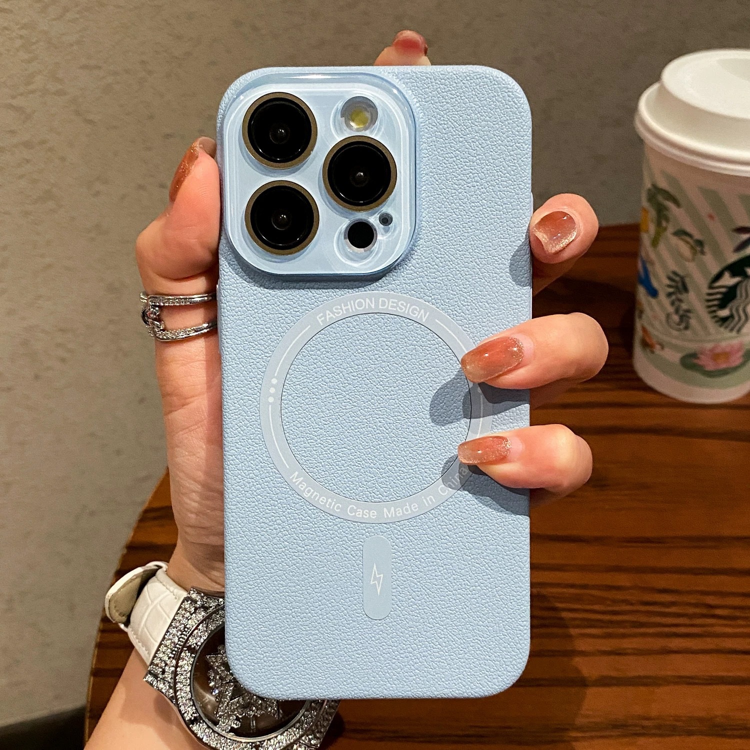 Aperición magnética de patrón de lichi de color sólido para Apple 16promax funda para teléfono móvil iPhone14/13 lente película 15P pareja