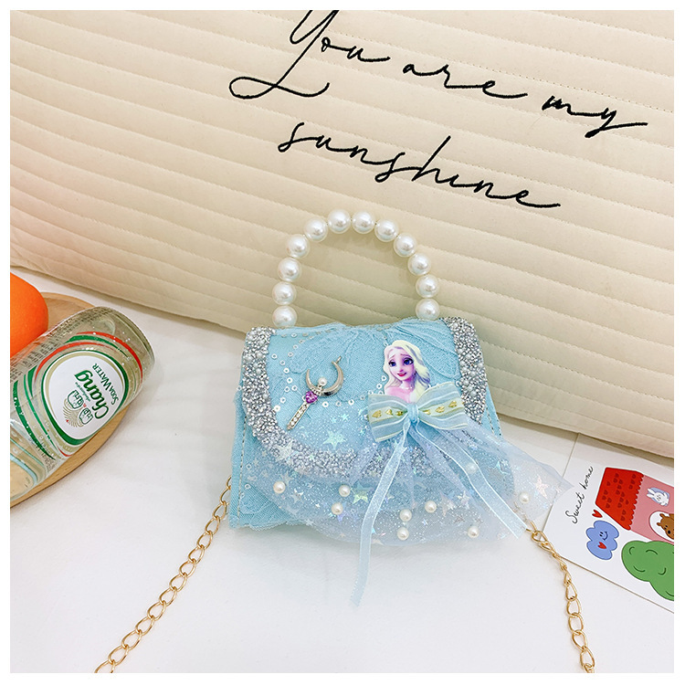 Nuevo bolso de moda para niños bolso de perla animado lindo arco de botón bolso de hombro de niñas cadena diagonal bolso pequeño
