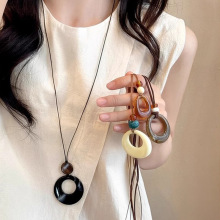 圆环吊坠黑绳长款项链女简约百搭高级感毛衣链秋冬小众卫衣链配饰