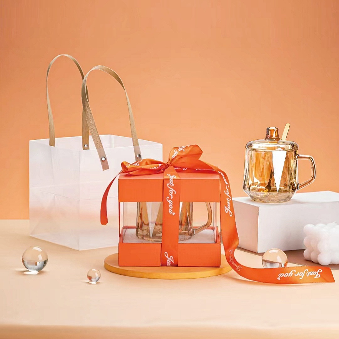 Vidrio de lujo ligero de alto aspecto creativo mango hexagonal taza verano colorido hogar agua taza apertura pequeño regalo