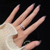 Cute adjustable universal ring with bow, simple and elegant design, on index finger