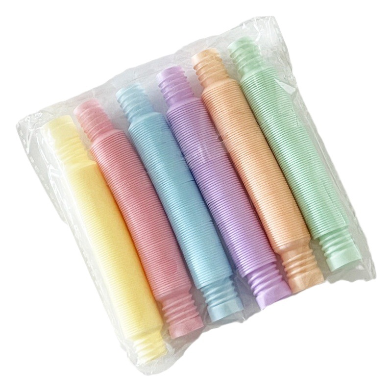 Tubo estirable antiestrés con sonido, diseño corrugado y colores pastel
